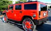 32 inch wielen met spinning wheelcaps op rode Hummer H2