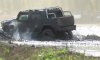 Muddin' in een Hummer H2 SUT op het Mudfest